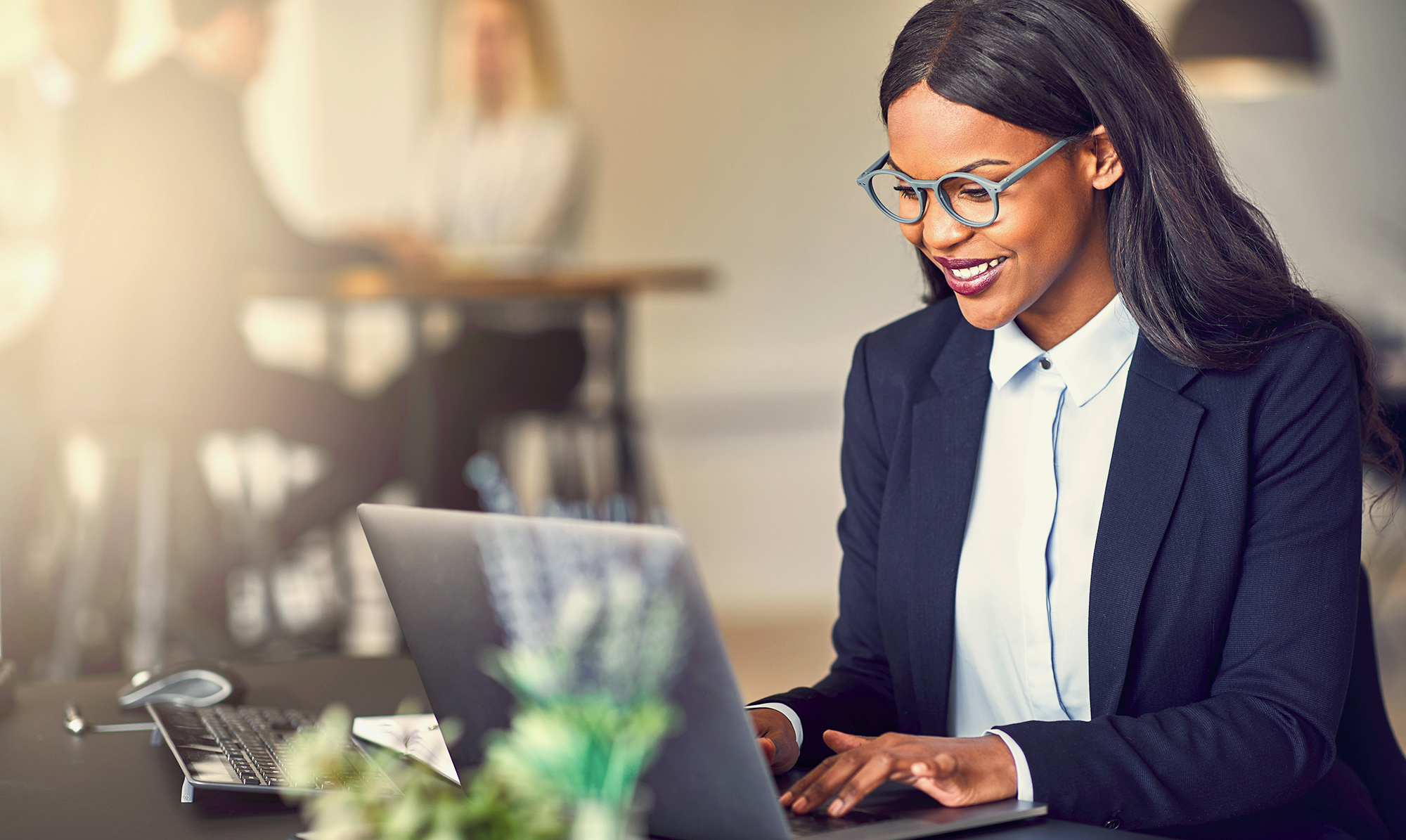 woman working on laptop at office