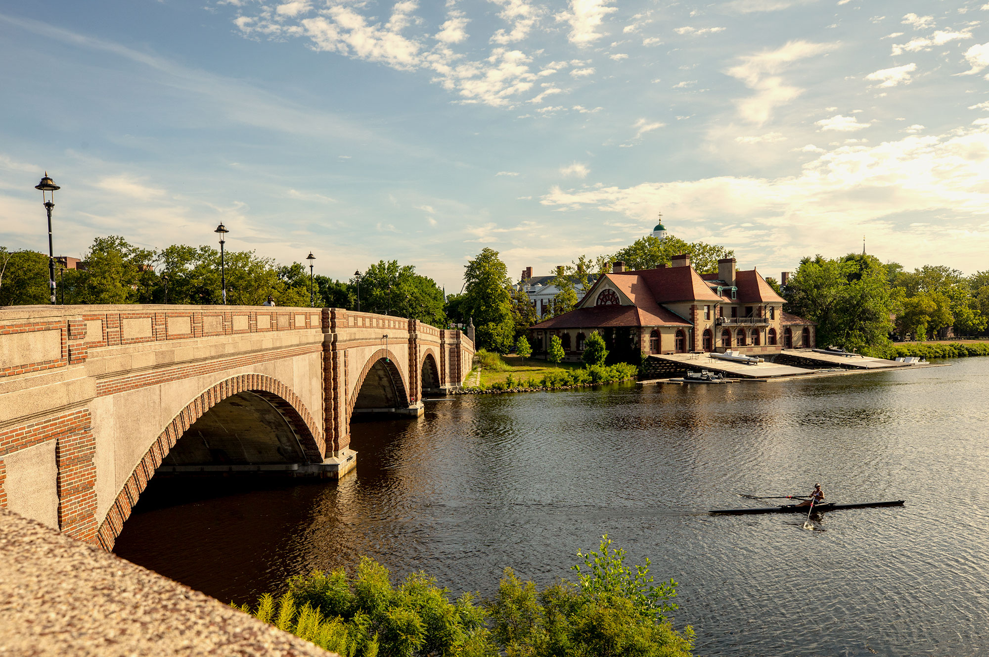 Looking across the Charles River to the Harvard Boathouse