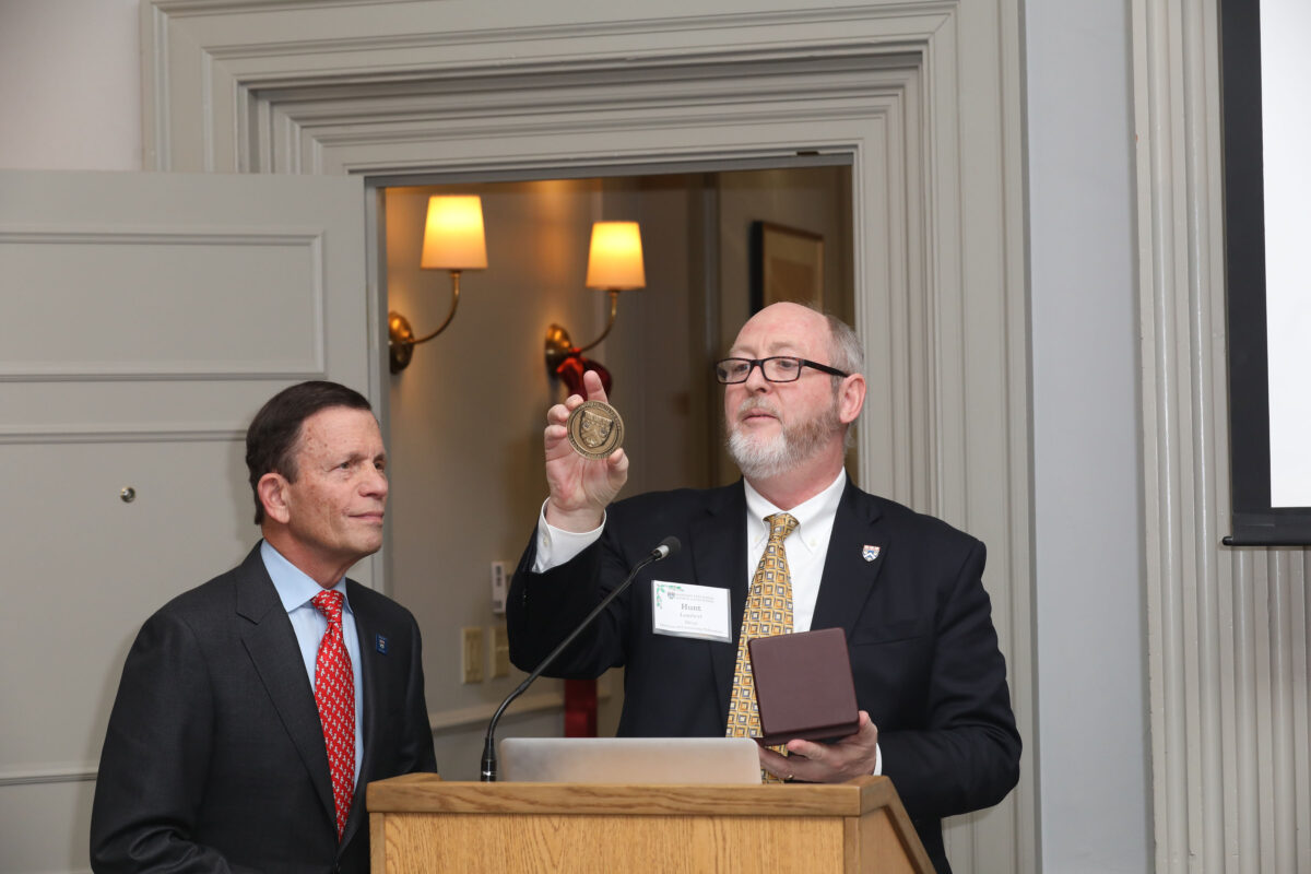 Edgar Grossman's son Steve and Dean Lambert celebrate Edgar's contributions to the HEAA