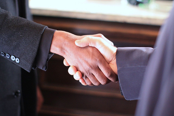 A close up image of a handshake