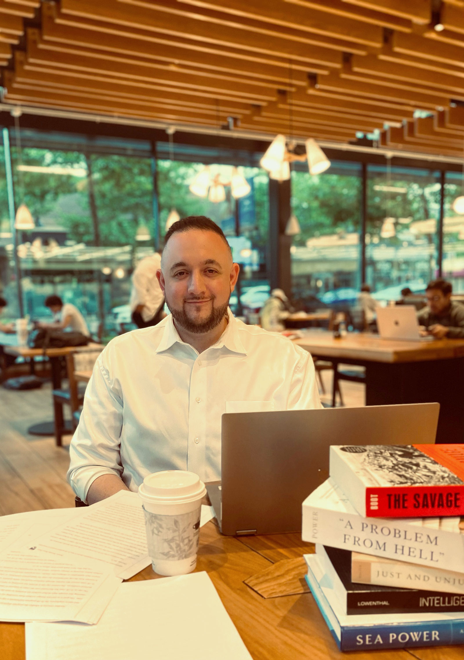 Travis Berent with books.