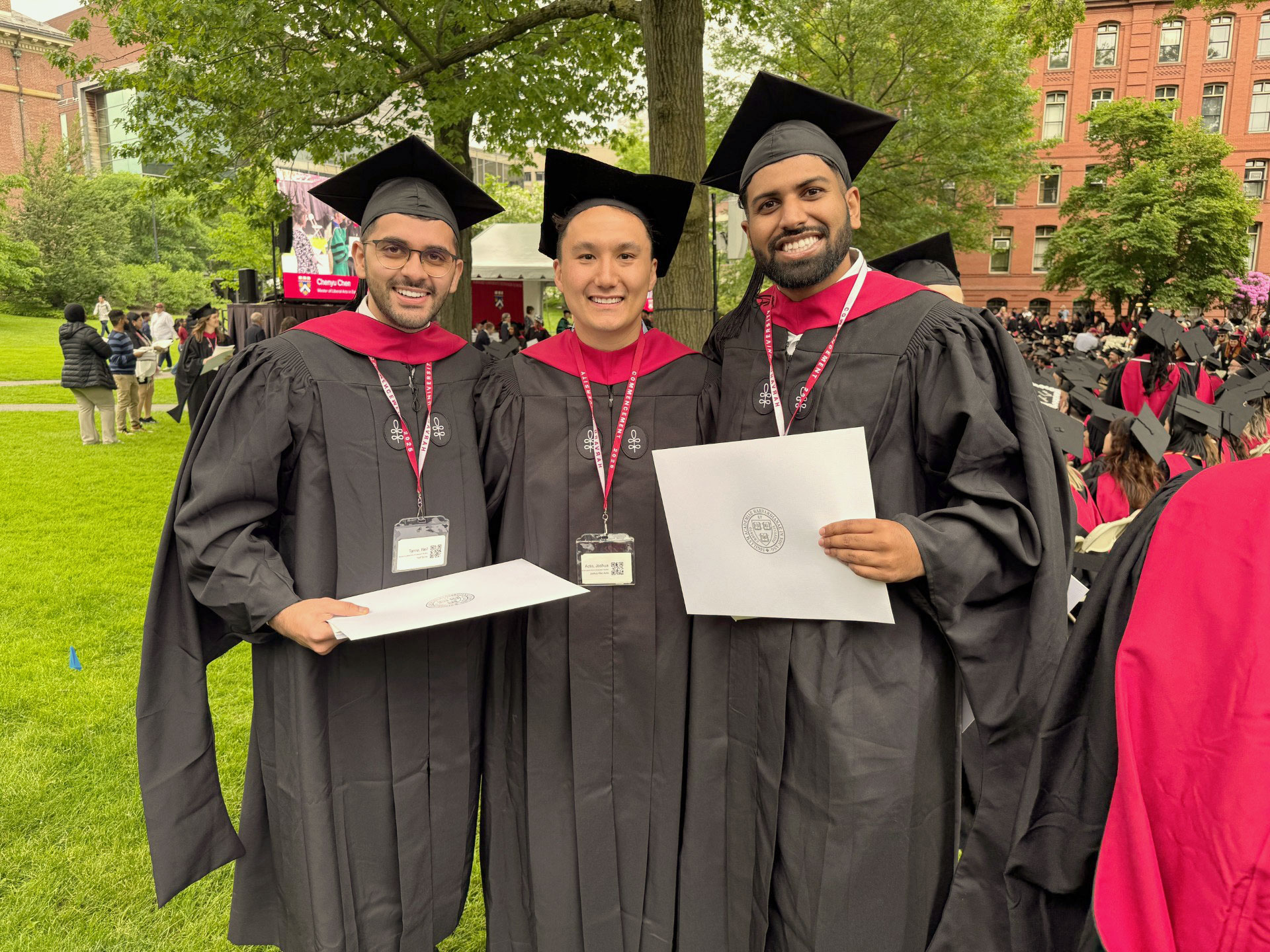 Neil at commencement with classmates.