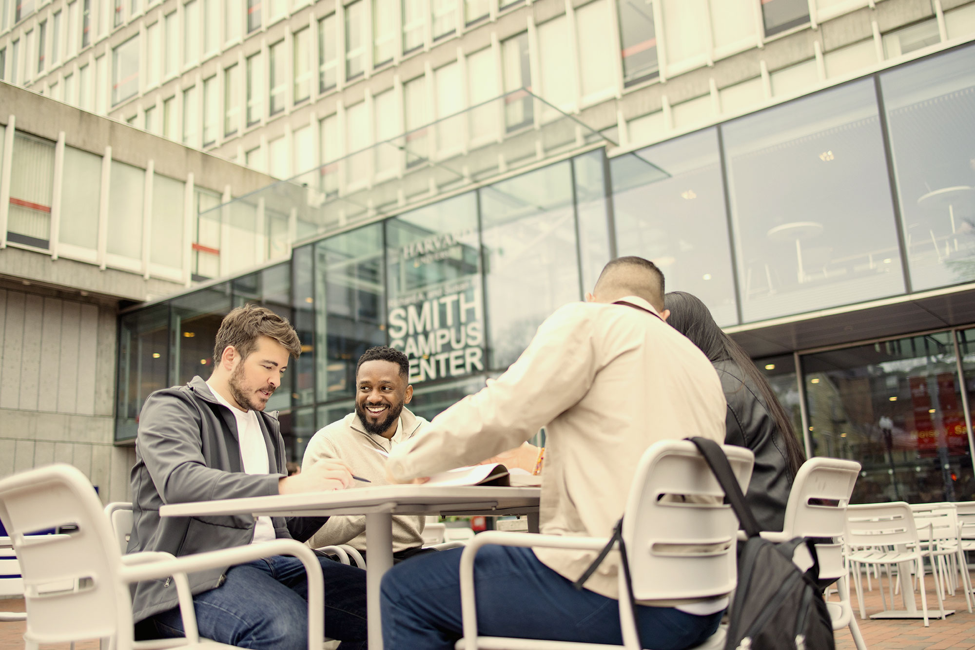 Harvard Extension Students studying at the Smith Campus Center.
