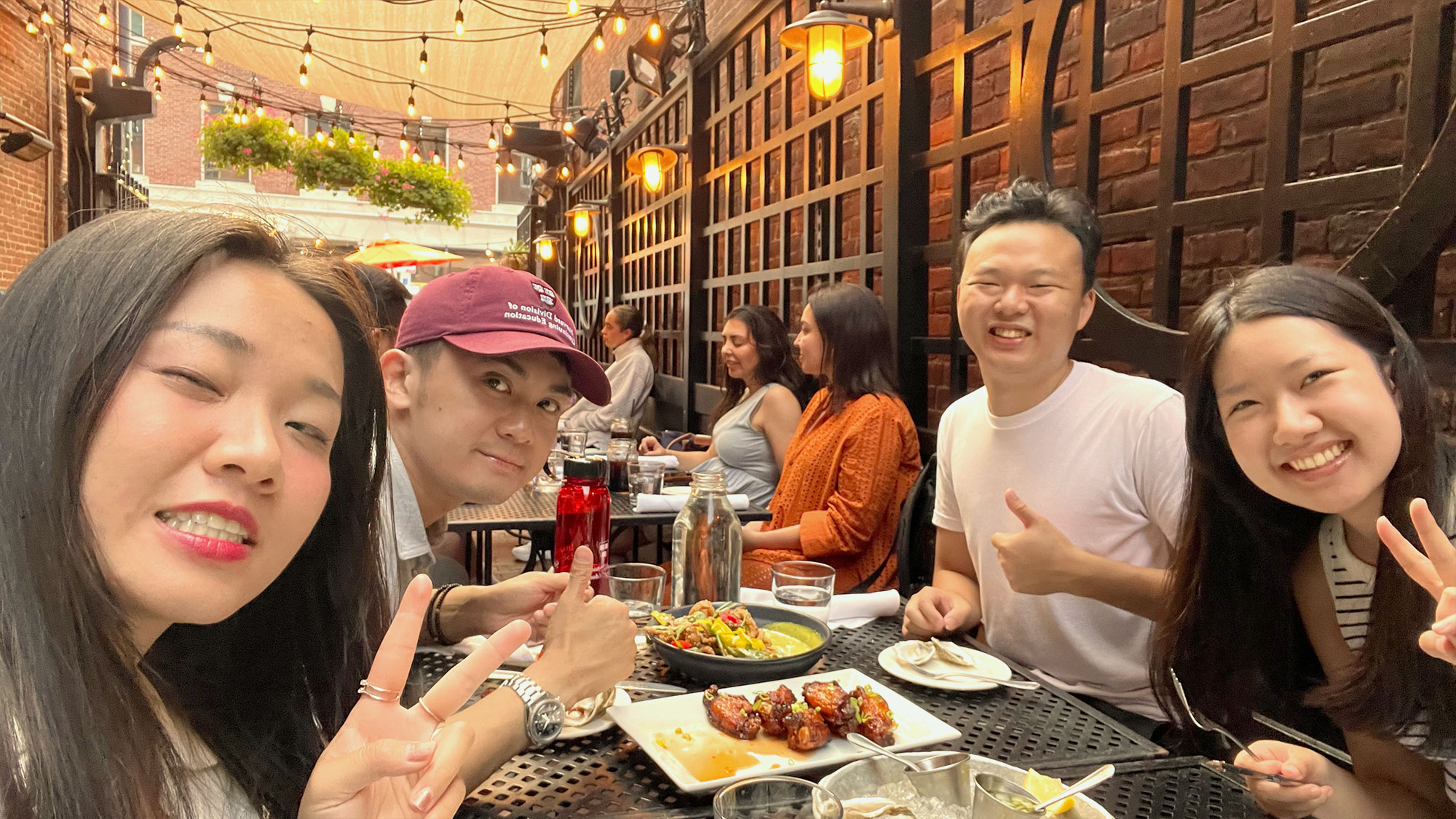 Helly Nguyen in Harvard Square with classmates.