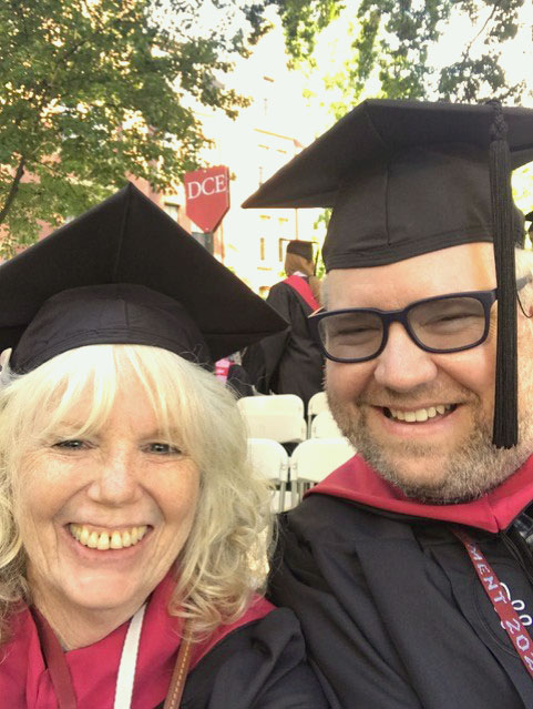 Harvard Extension School graduate, Lesley Bannatyne, at Harvard's graduation with a classmate.