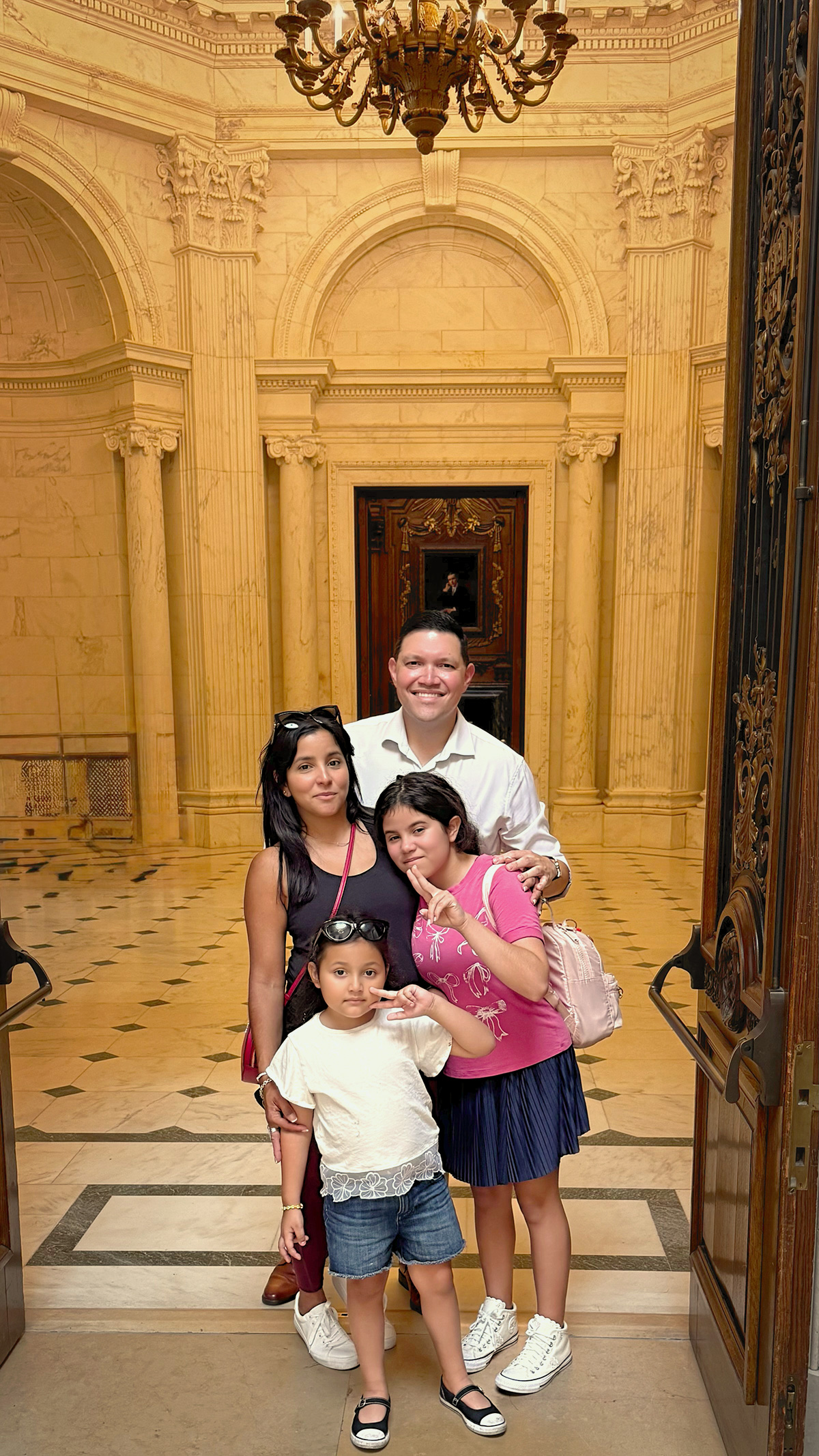 Jose Quiles with his wife and two children, visiting Harvard's campus.