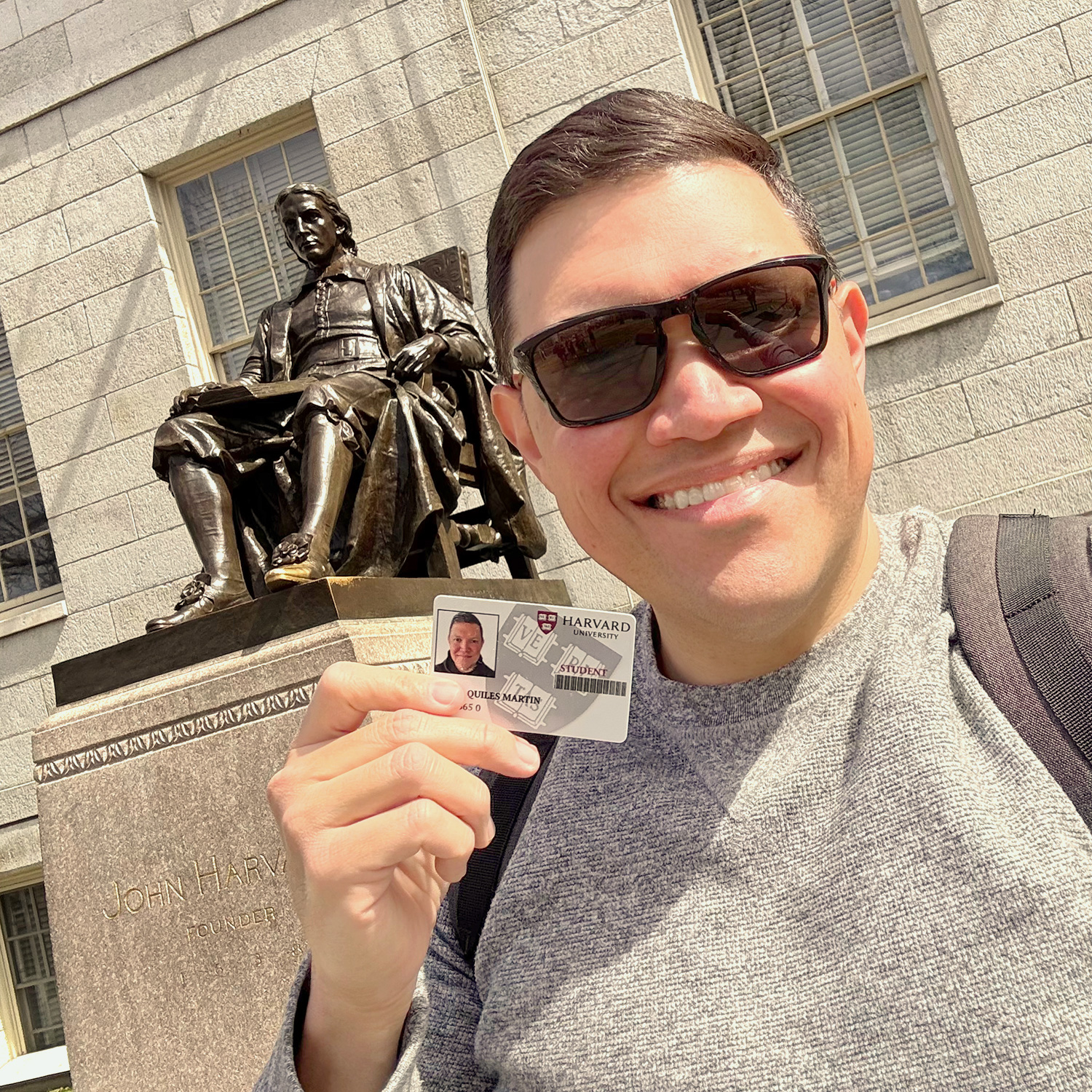 Jose Quiles in front of the John Harvard statue.
