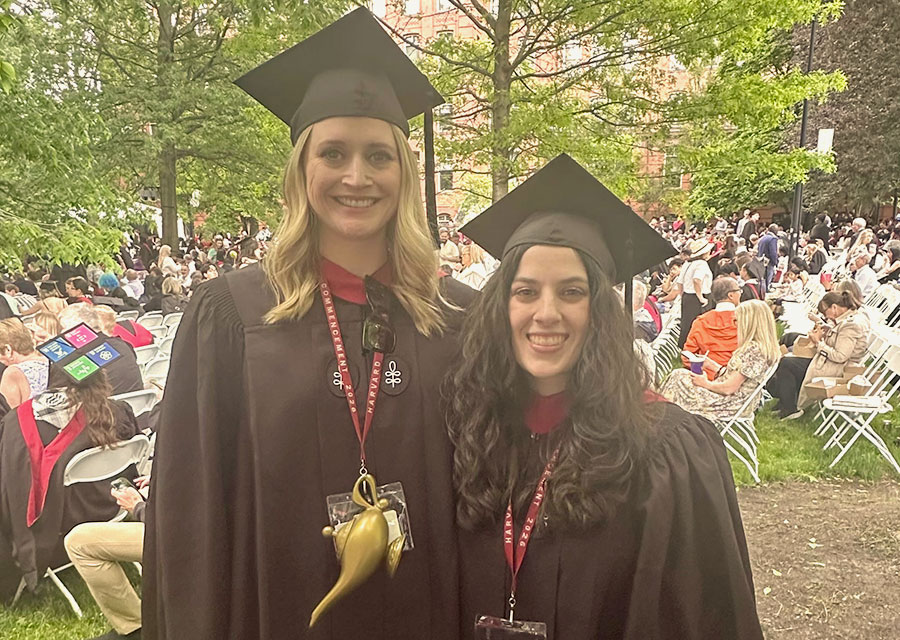 Becca Perkel-Moon and a classmate at Harvard University Commencement.