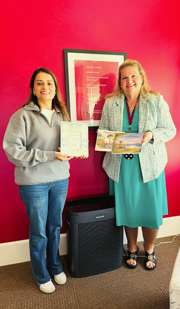 Meghna Middha with Dean Nancy Coleman.