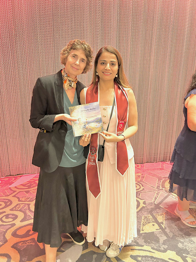 Meghna Middha with Dean Suzanne Spreadbury.