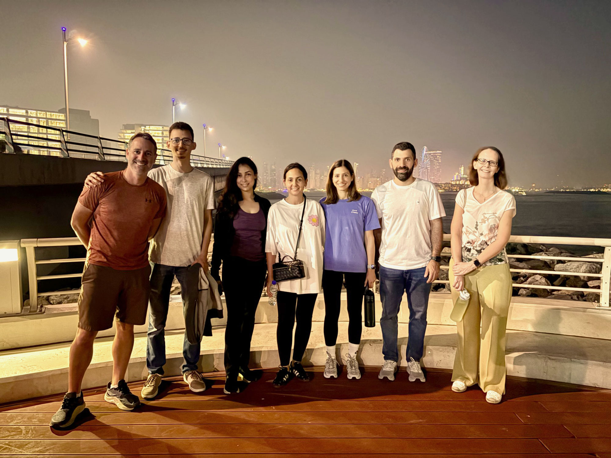 A group of Harvard Extension School students pose for a photo in Dubai.